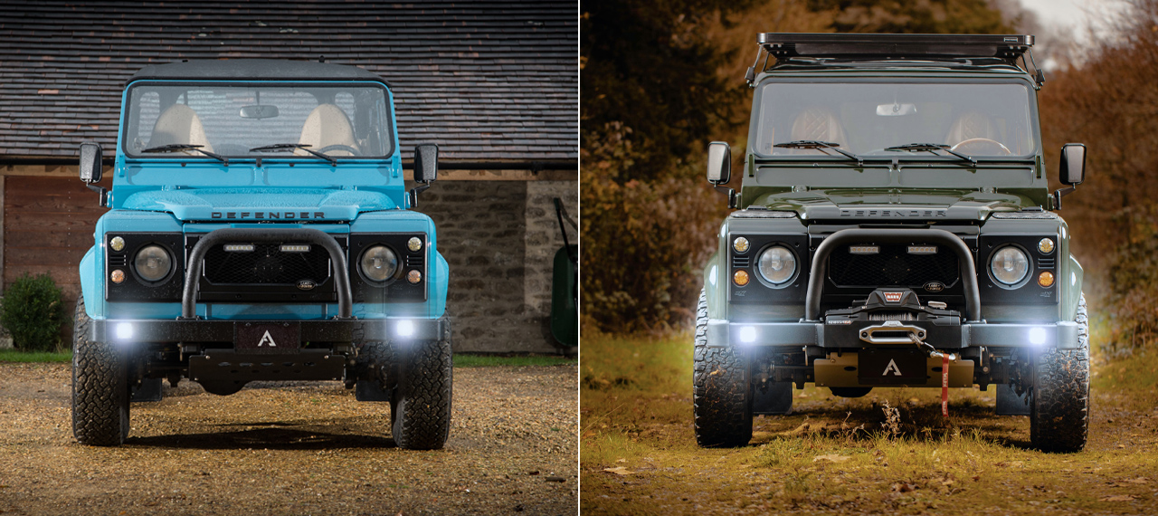 Split front view of two Defenders with lights on