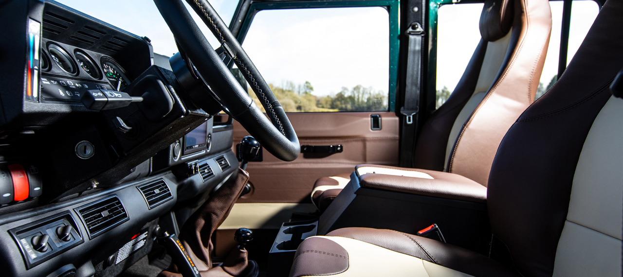 Defender with two-tone brown leather interior front seats