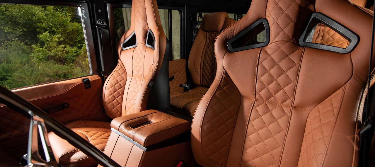 Defender orange leather interior with Elite sports seats