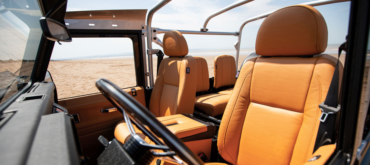 Leather interior of a Defender 90 with roof down