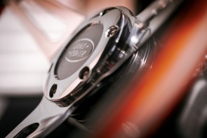 Close-up detail of Evander wood rimmed steering wheel.