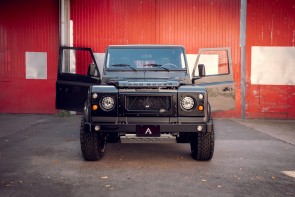 A Bonatti Grey Defender front on view with doors open.