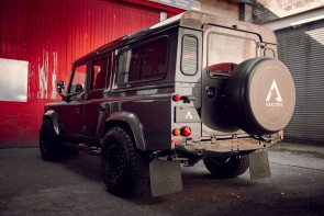 Back and side view of Defender in Bonatti Grey with Arkonik wheel cover.