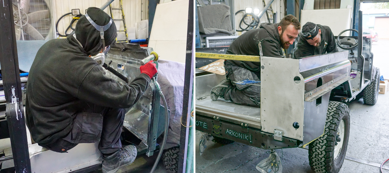 Arkonik Body Shop team members working on a Defender