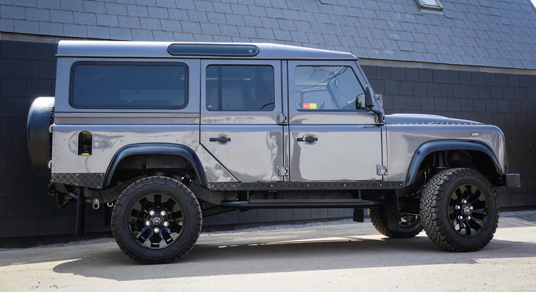 Side view of Arkonik grey Defender D110