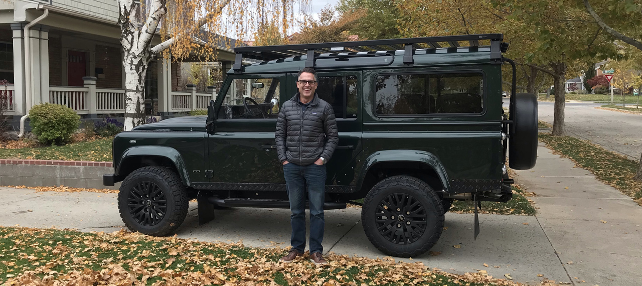 Arkonik client taking delivery of his new Land Rover Defender
