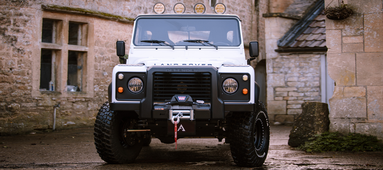 Front view of white Arkonik Defender pick-up