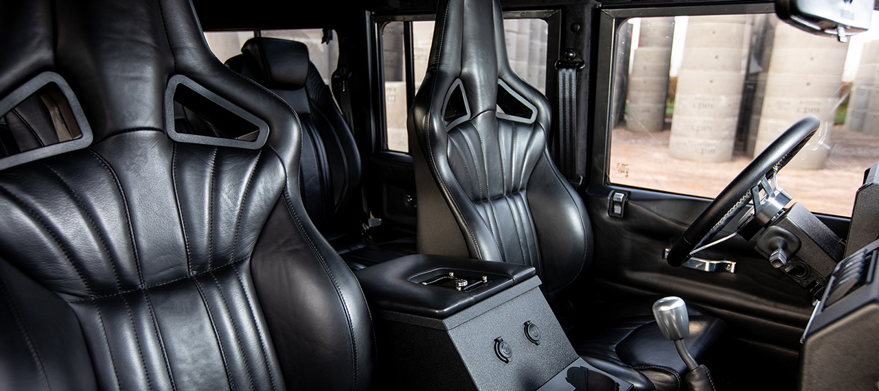 View of front Elite Sports seats in black supersoft leather.