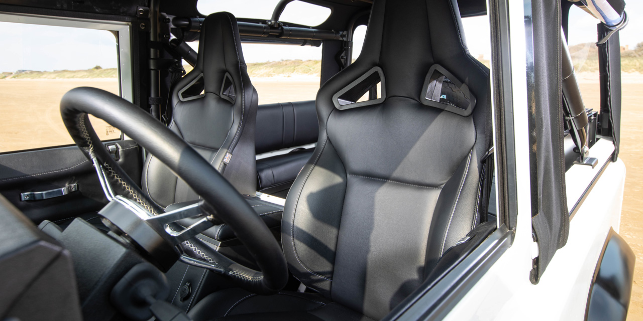 Interior view of Defender 90 with Elite Sports front seats