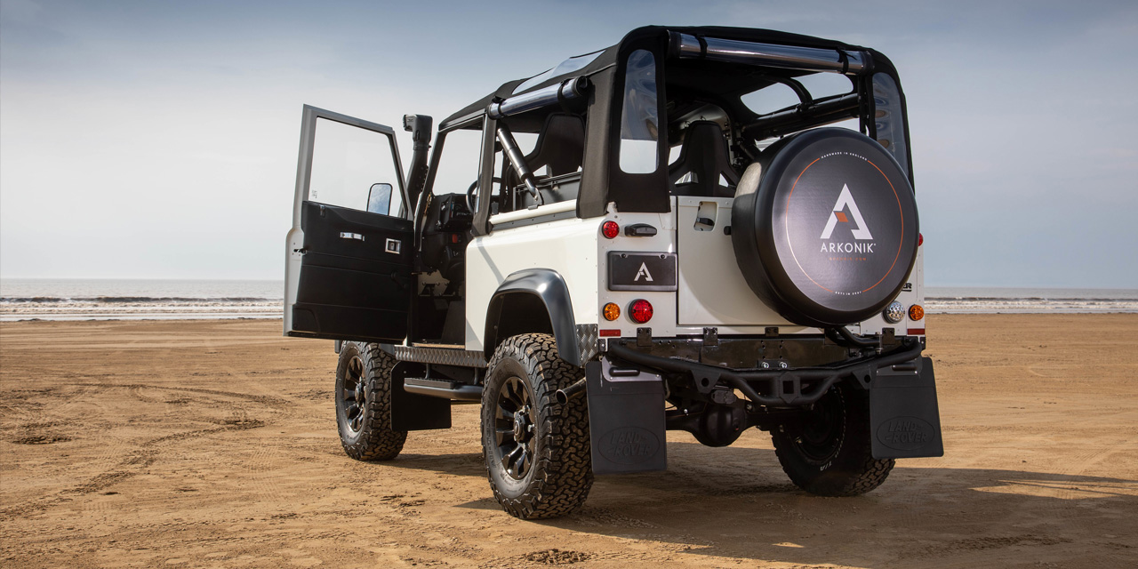 Rear view of DUNE Defender 90 soft-top with doors open