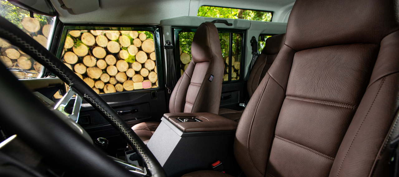 Defender brown leather interior showing front seats