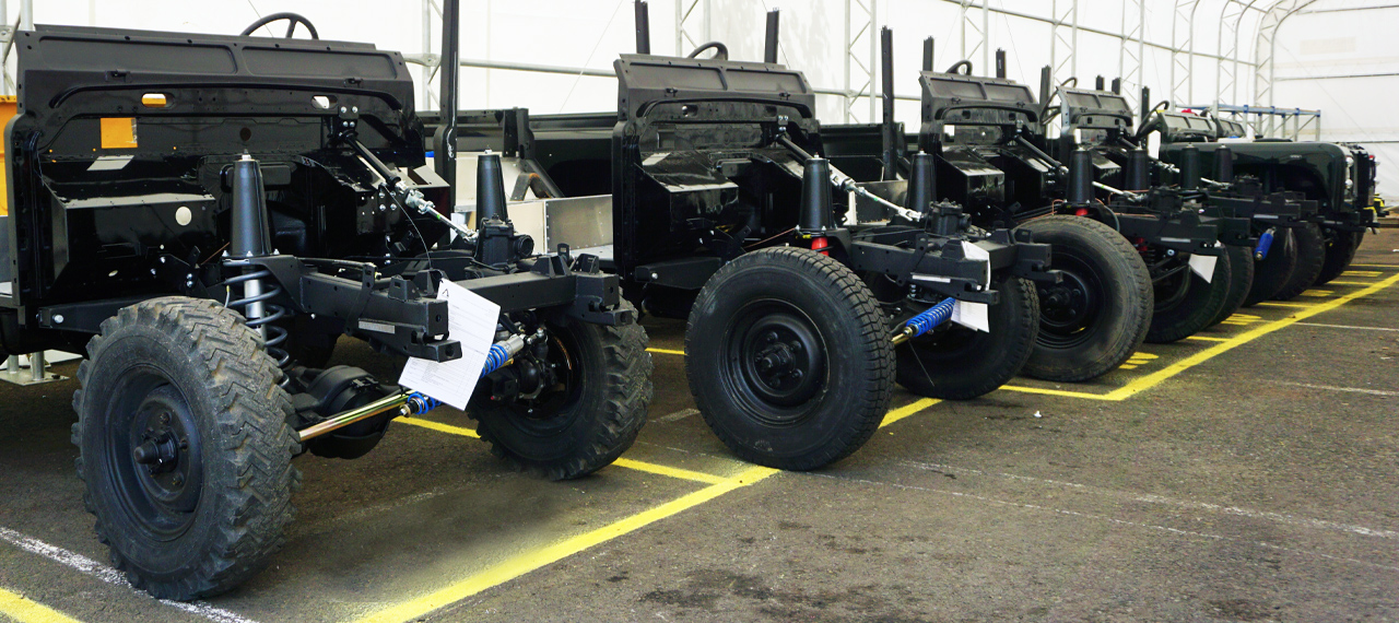 Row of Arkonik Defender chassis at Arkonik HQ