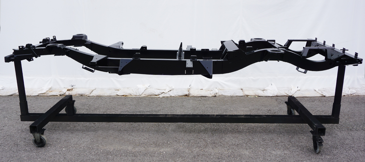 Side view of a gloss black Defender chassis
